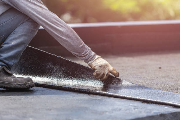 Professional Waterproofing technician working in Merrick, NY